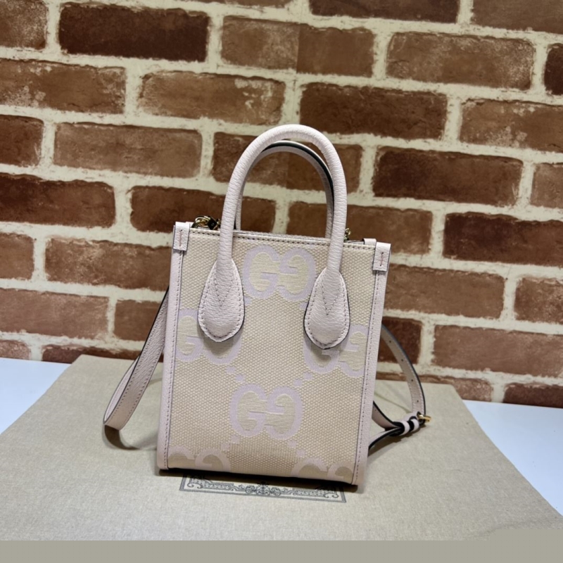 G*u*i top handle bags
